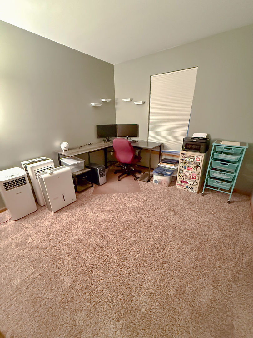 828 Spring Meadow Lane Malta, IL 60150 - Photo 13 of 19 a living room with furniture and a window