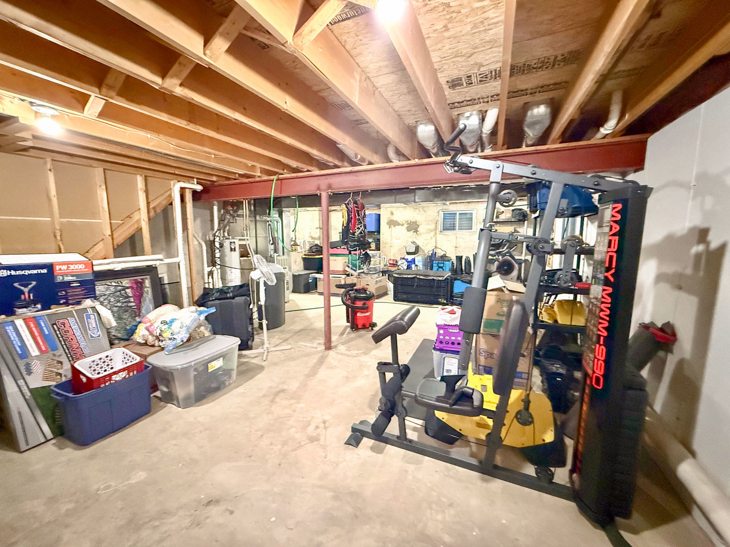 828 Spring Meadow Lane Malta, IL 60150 - Photo 17 of 19 a view of a room with gym equipment