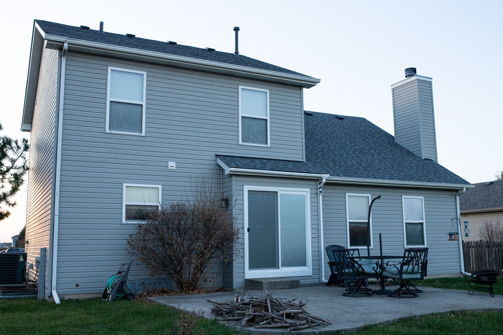 828 Spring Meadow Lane Malta, IL 60150 - Photo 3 of 19 a front view of a house with patio