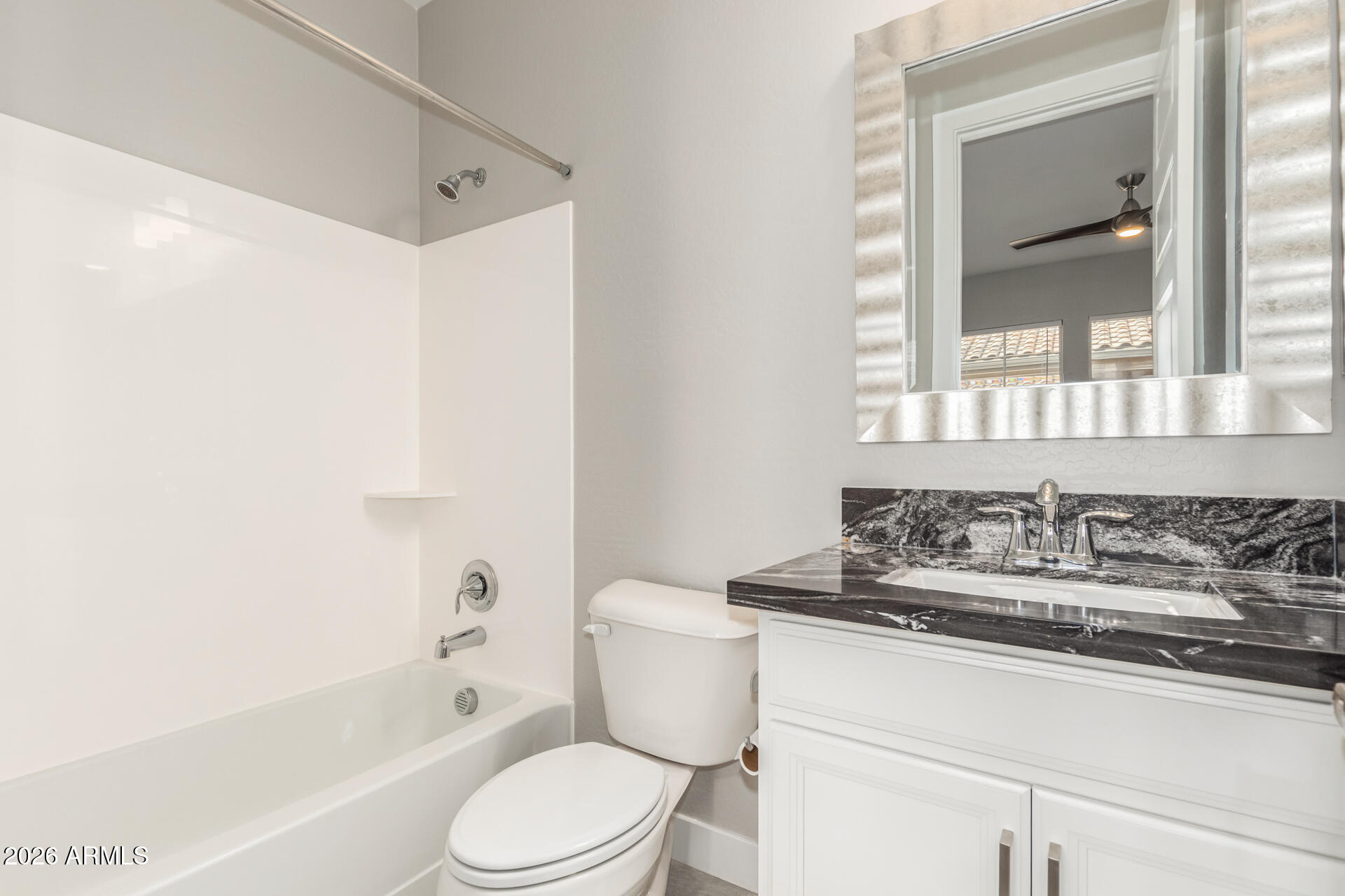 1873 South Follett Way Gilbert, AZ 85295 - Photo 17 of 40 a bathroom with a sink toilet and shower