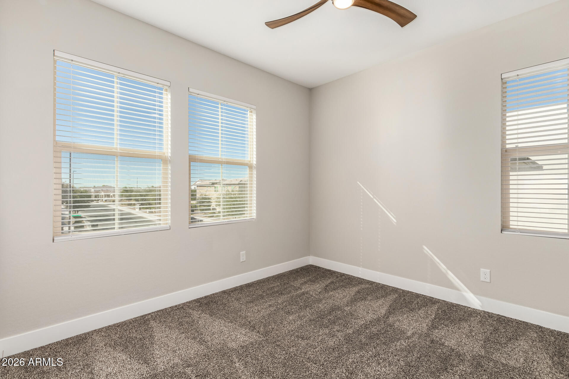 1873 South Follett Way Gilbert, AZ 85295 - Photo 22 of 40 an empty room with a window