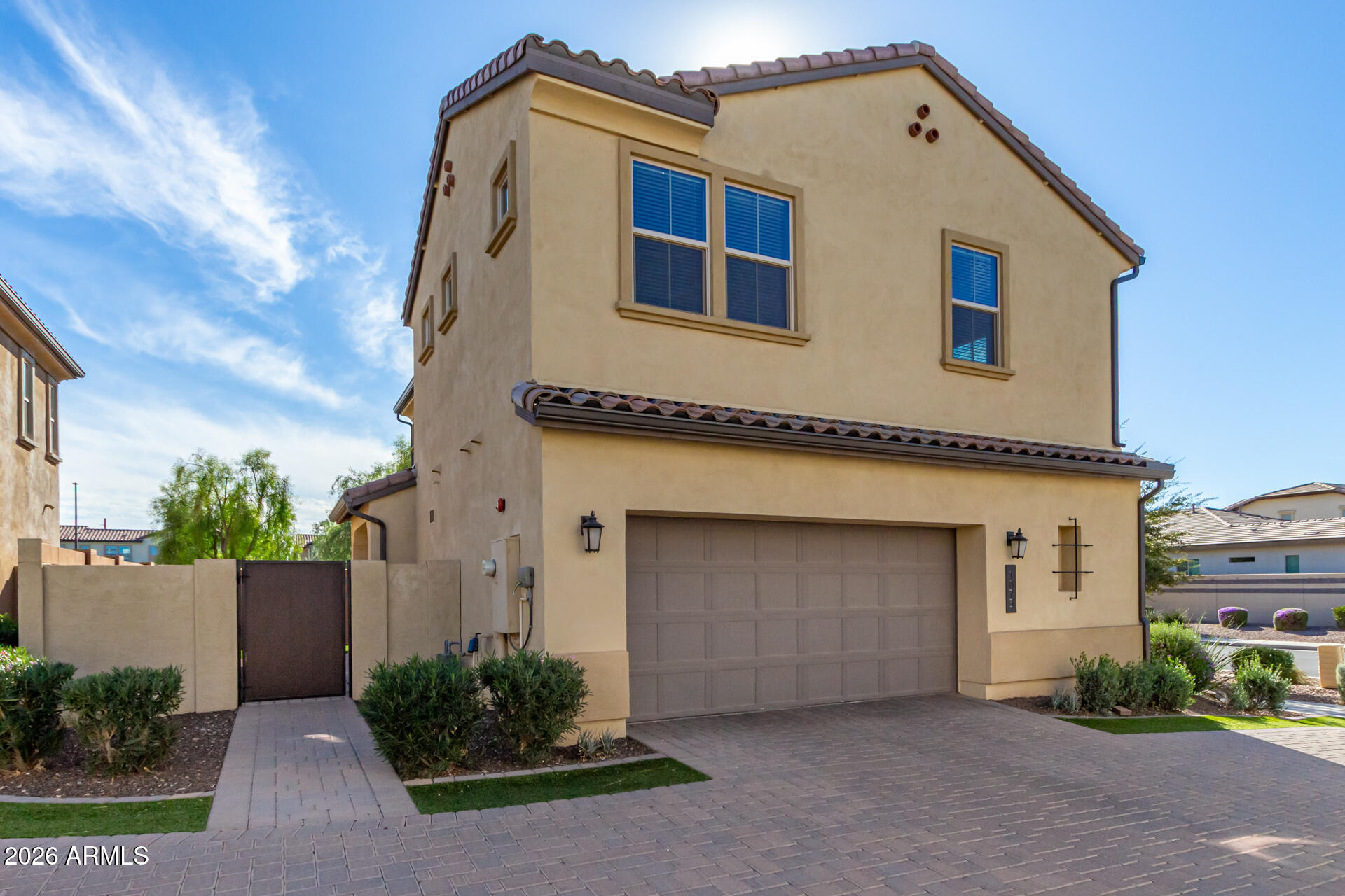1873 South Follett Way Gilbert, AZ 85295 - Photo 32 of 40 a front view of a house with garden