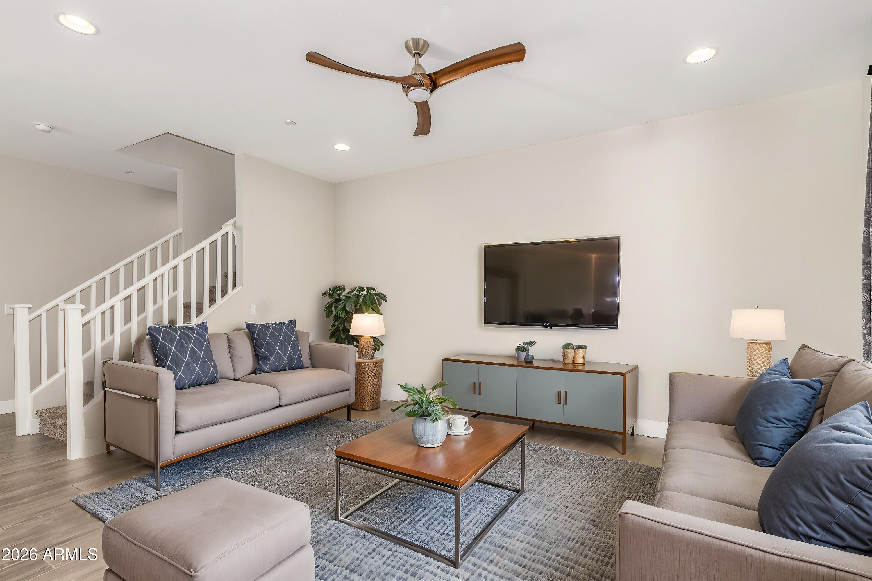 1873 South Follett Way Gilbert, AZ 85295 - Photo 4 of 40 a living room with furniture and a flat screen tv