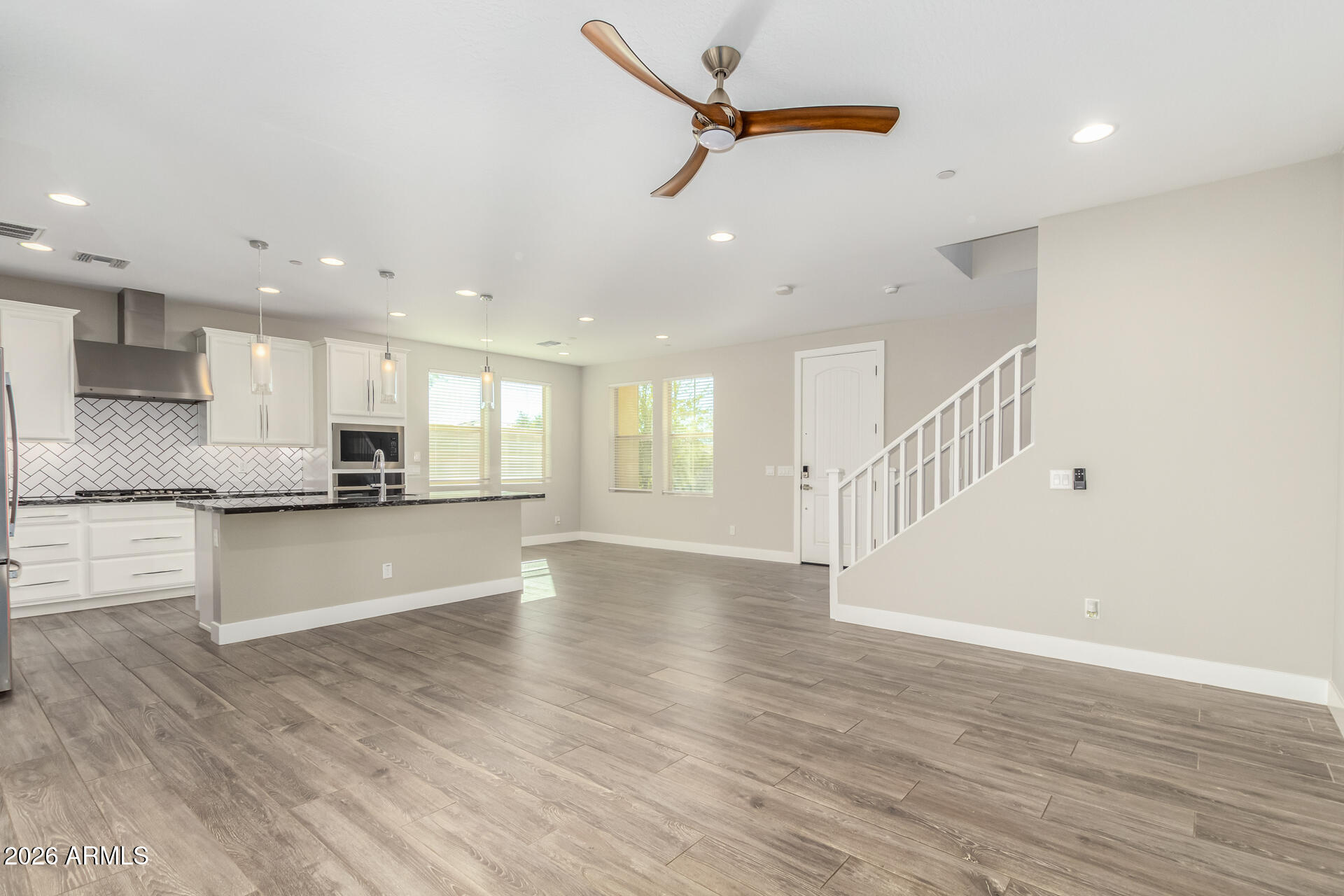 1873 South Follett Way Gilbert, AZ 85295 - Photo 9 of 40 a view of kitchen with sink and wooden floor