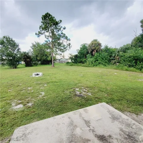 a view of outdoor space and yard