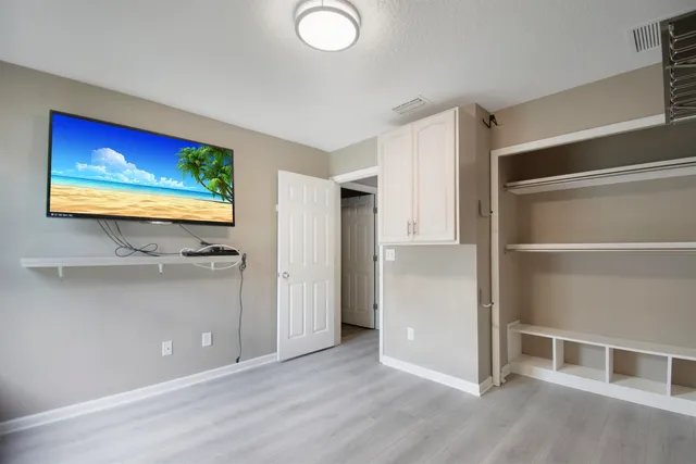 a view of a livingroom with wooden floor