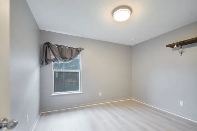 an empty room with a window