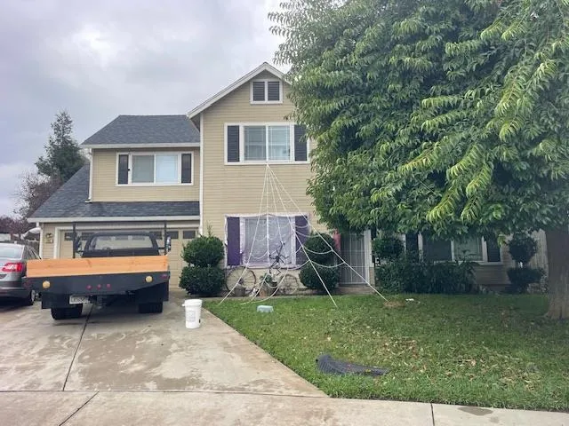 front view of house with a yard