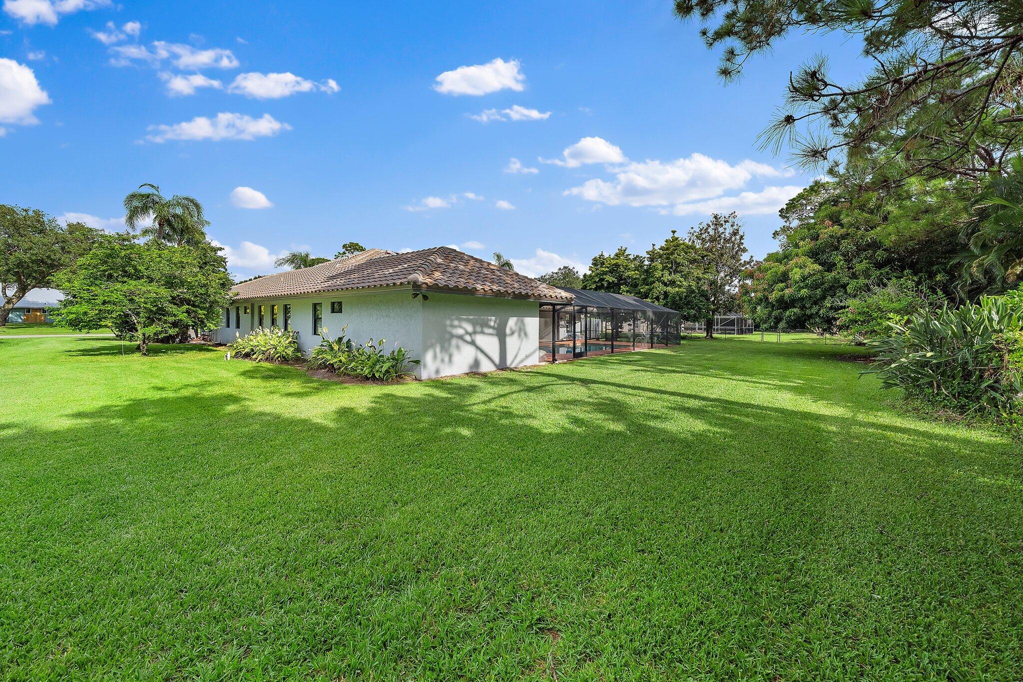 6464 Wood Lake Road Jupiter, FL 33458 - Photo 47 of 60 052-6464WoodLakeRd-Jupiter-FL-SMALL