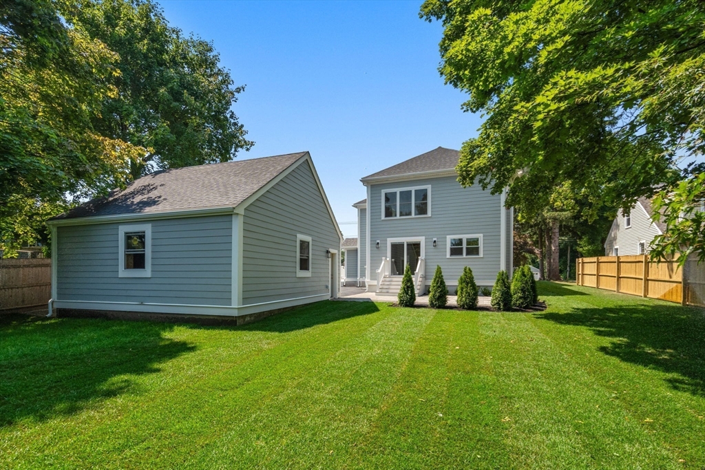 128 Webster Street Needham, MA 02494 - Photo 2 of 30 a front view of house with yard and green space