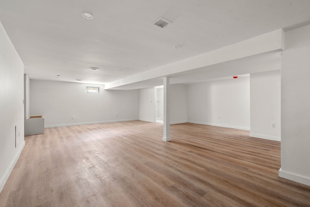 128 Webster Street Needham, MA 02494 - Photo 21 of 30 wooden floor in an empty room