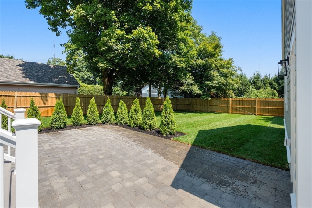 128 Webster Street Needham, MA 02494 - Photo 29 of 30 a view of a garden with a small yard