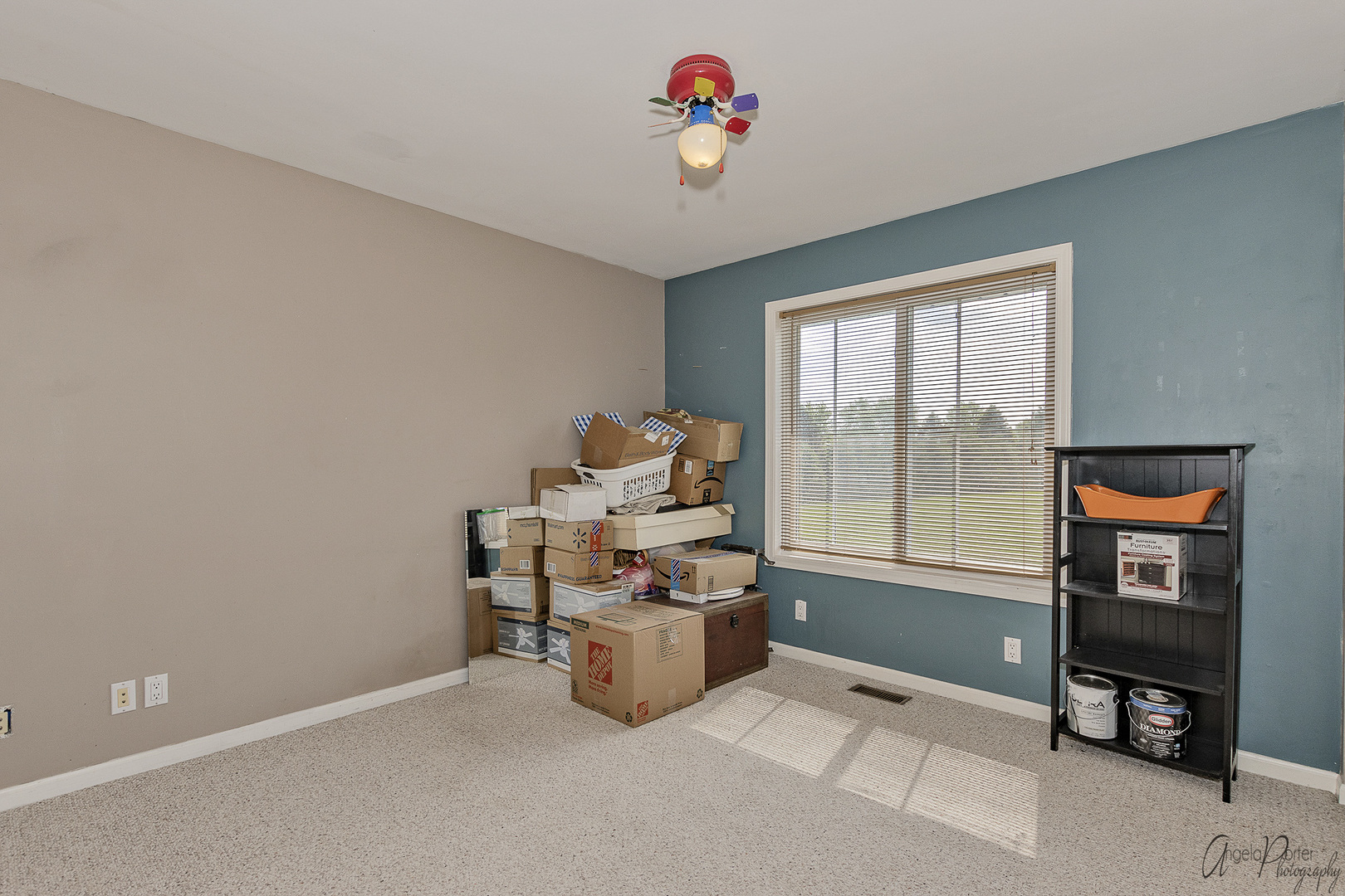 9719 Richardson Road Spring Grove, IL 60081 - Photo 18 of 26 a living room with furniture and a flat screen tv