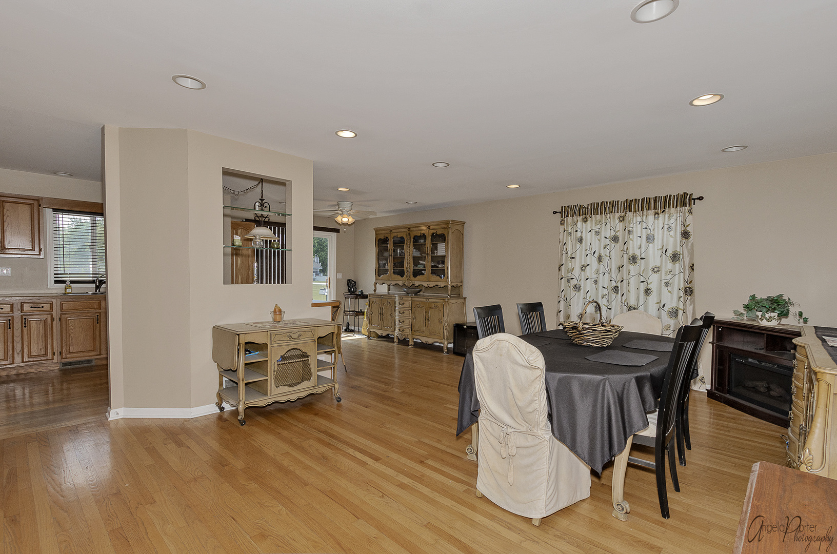 9719 Richardson Road Spring Grove, IL 60081 - Photo 3 of 26 a view of a dining room with furniture and wooden floor