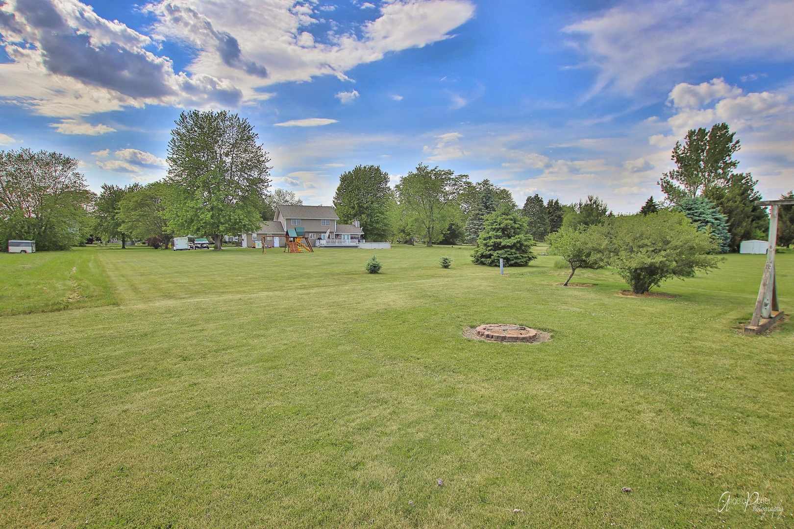 9719 Richardson Road Spring Grove, IL 60081 - Photo 22 of 26 a view of a golf course with a trees