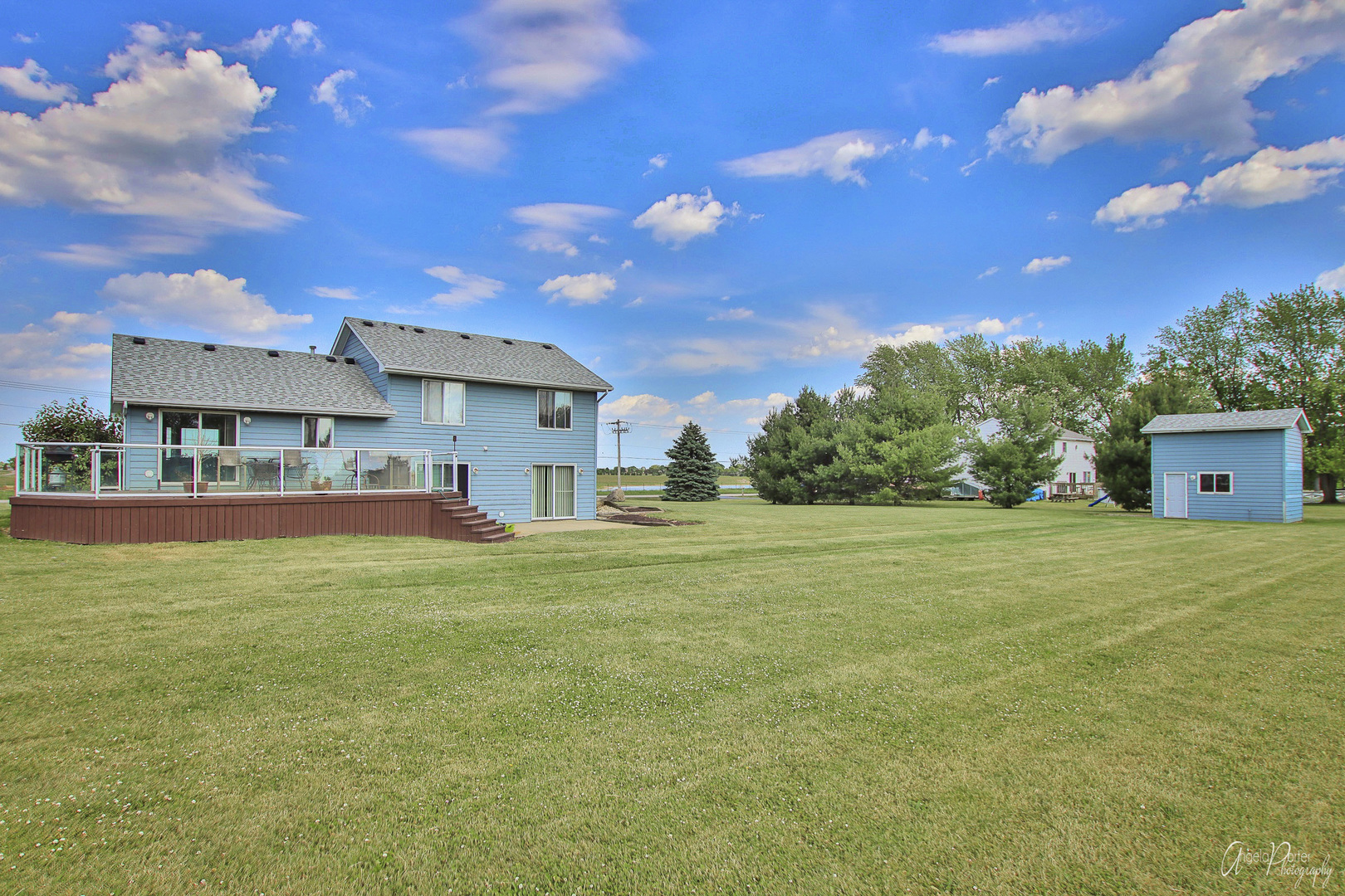 9719 Richardson Road Spring Grove, IL 60081 - Photo 23 of 26 a view of house in front of a big yard with large trees