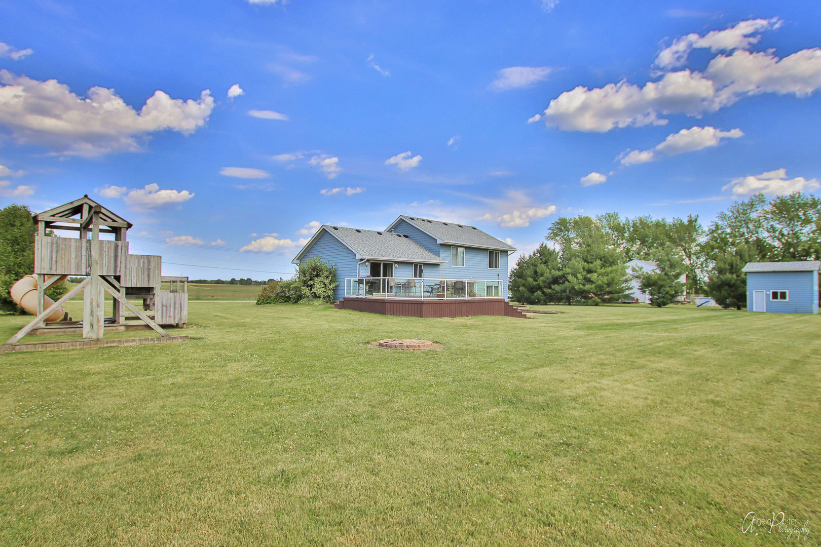 9719 Richardson Road Spring Grove, IL 60081 - Photo 26 of 26 a view of a big house with a big yard