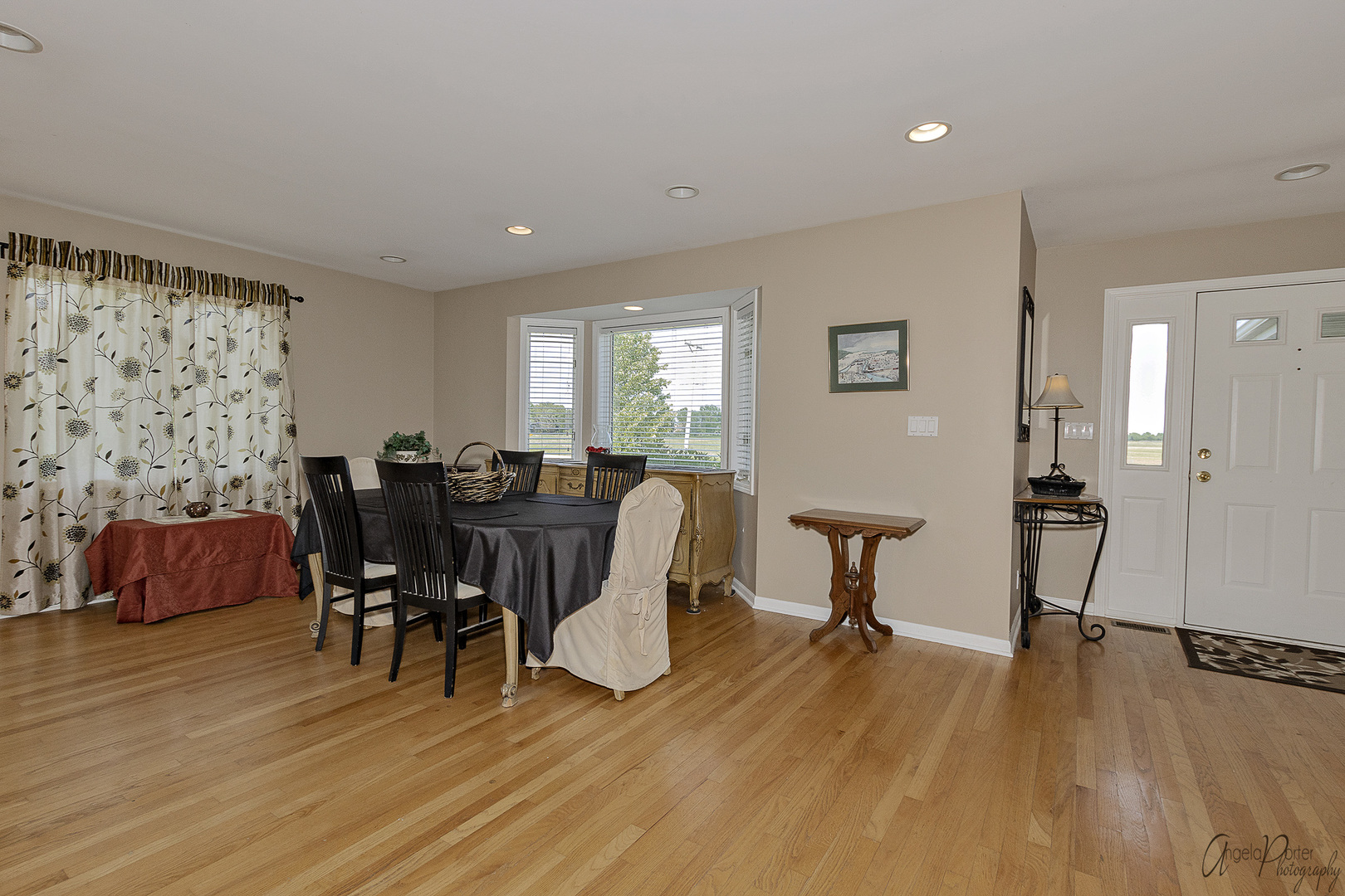 9719 Richardson Road Spring Grove, IL 60081 - Photo 4 of 26 a living room with furniture and a wooden floor