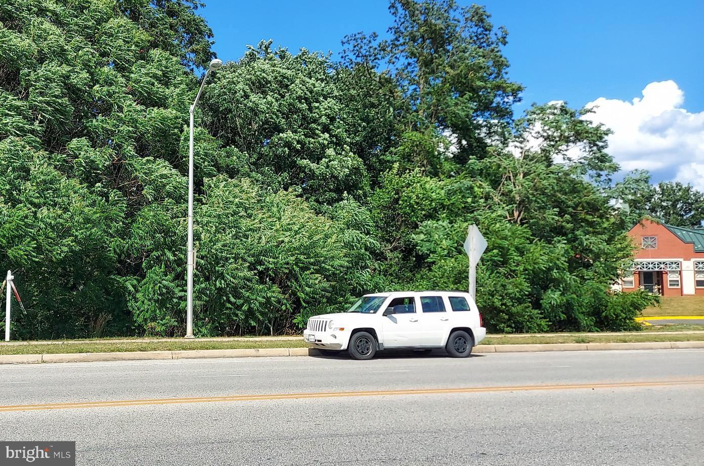 0 Briggs Chaney Road Silver Spring, MD 20905 - Photo 2 of 2 a car parked on the side of the road