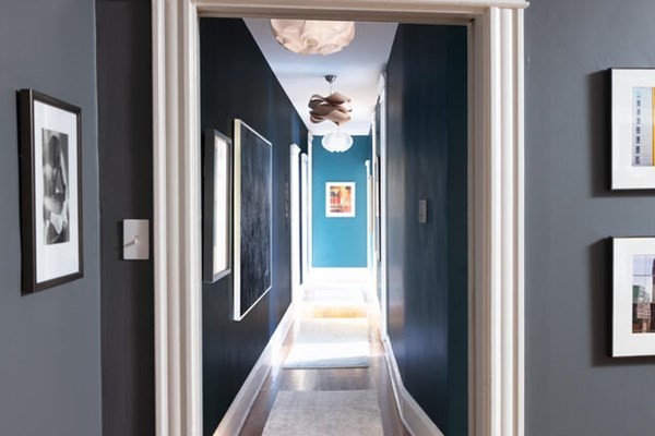 30 Powell Street, Unit 2 Brookline, MA 02446 - Photo 11 of 27 a view of a hallway with wooden floor and stairs