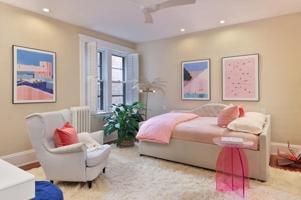 30 Powell Street, Unit 2 Brookline, MA 02446 - Photo 13 of 27 a bedroom with a bed and a couch