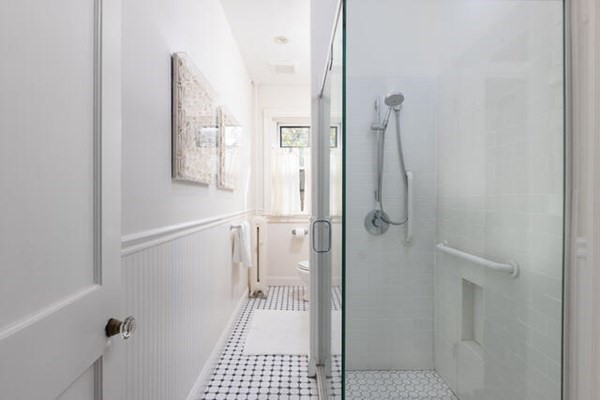 30 Powell Street, Unit 2 Brookline, MA 02446 - Photo 17 of 27 a bathroom with a shower and toilet