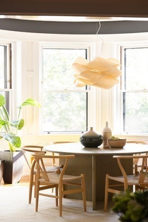 30 Powell Street, Unit 2 Brookline, MA 02446 - Photo 3 of 27 a living room with a table and a window