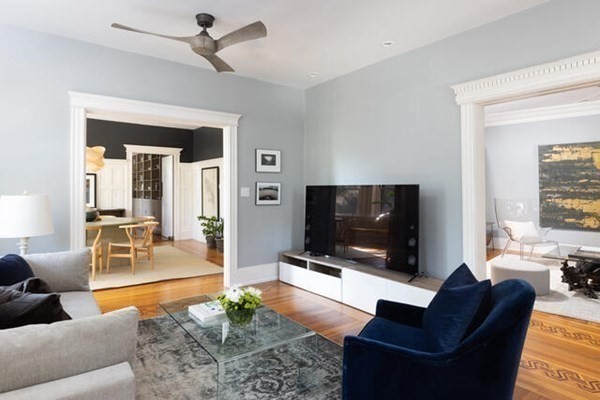 30 Powell Street, Unit 2 Brookline, MA 02446 - Photo 4 of 27 a living room with furniture and a flat screen tv
