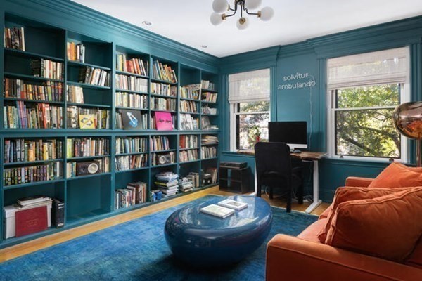 30 Powell Street, Unit 2 Brookline, MA 02446 - Photo 6 of 27 a living room with furniture and a book shelf