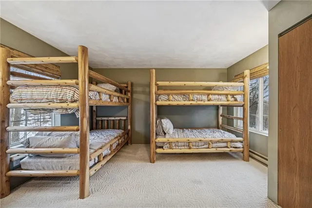 a bedroom with furniture and window