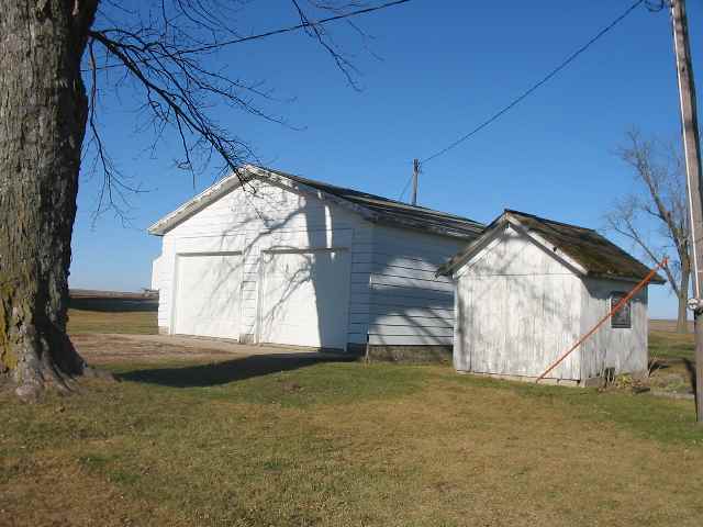 9082 Beede Road Mount Carroll, IL 61053 - Photo 3 of 8 a view of a house with a yard