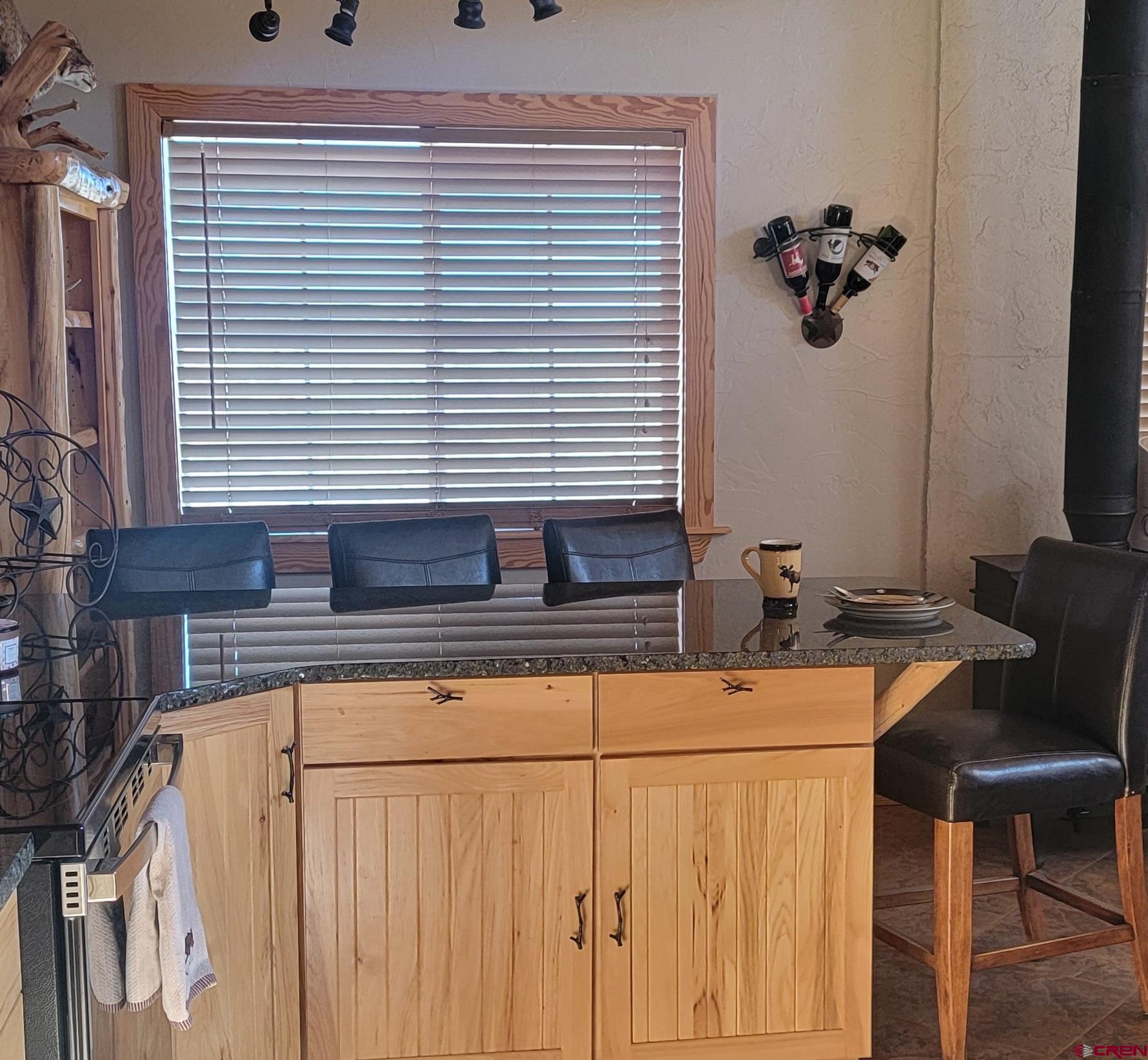 74 Owhi Road South Fork, CO 81154 - Photo 14 of 41 a bathroom with a sink and a mirror