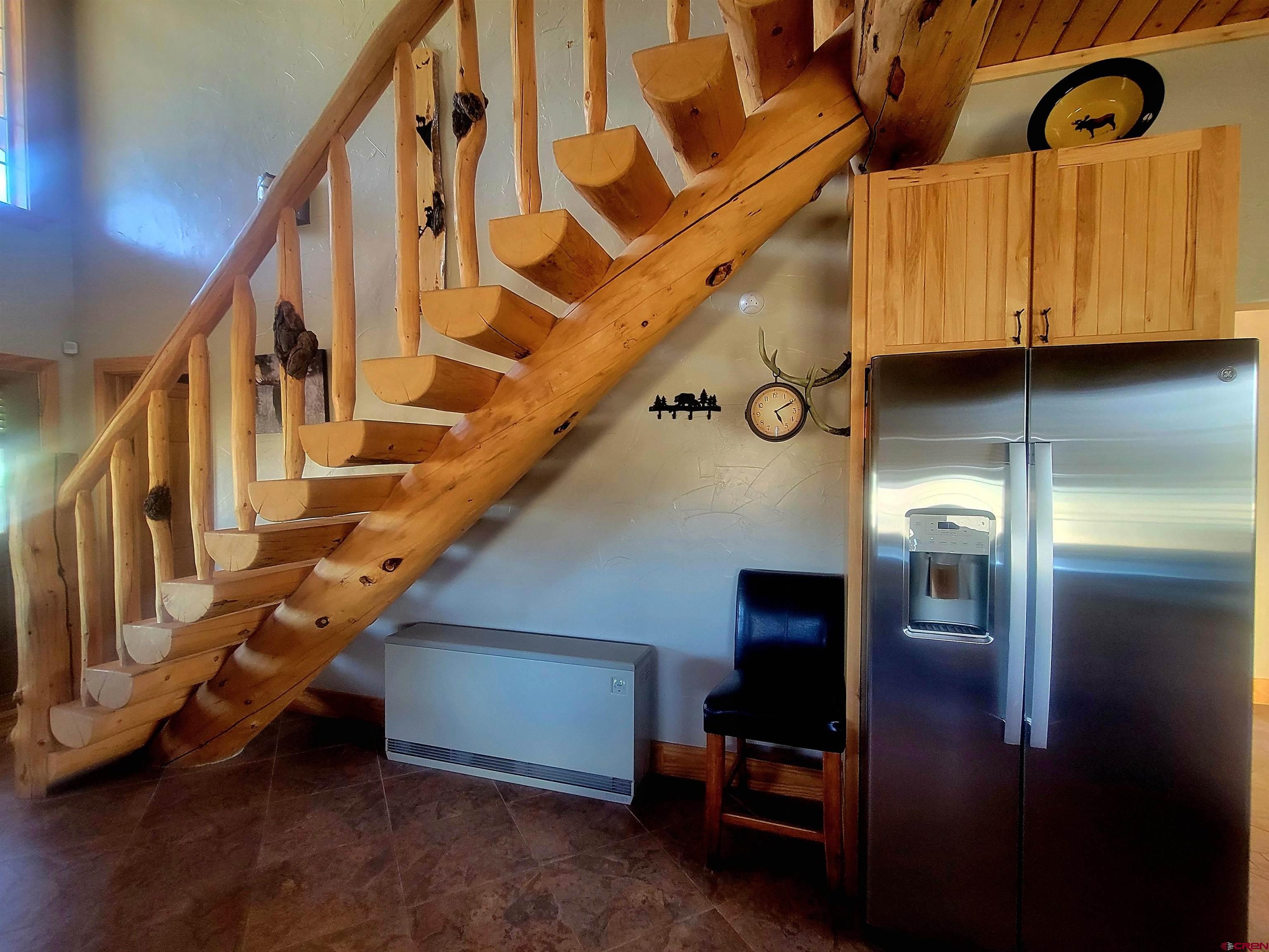 74 Owhi Road South Fork, CO 81154 - Photo 31 of 41 a view of entryway and hall with wooden floor