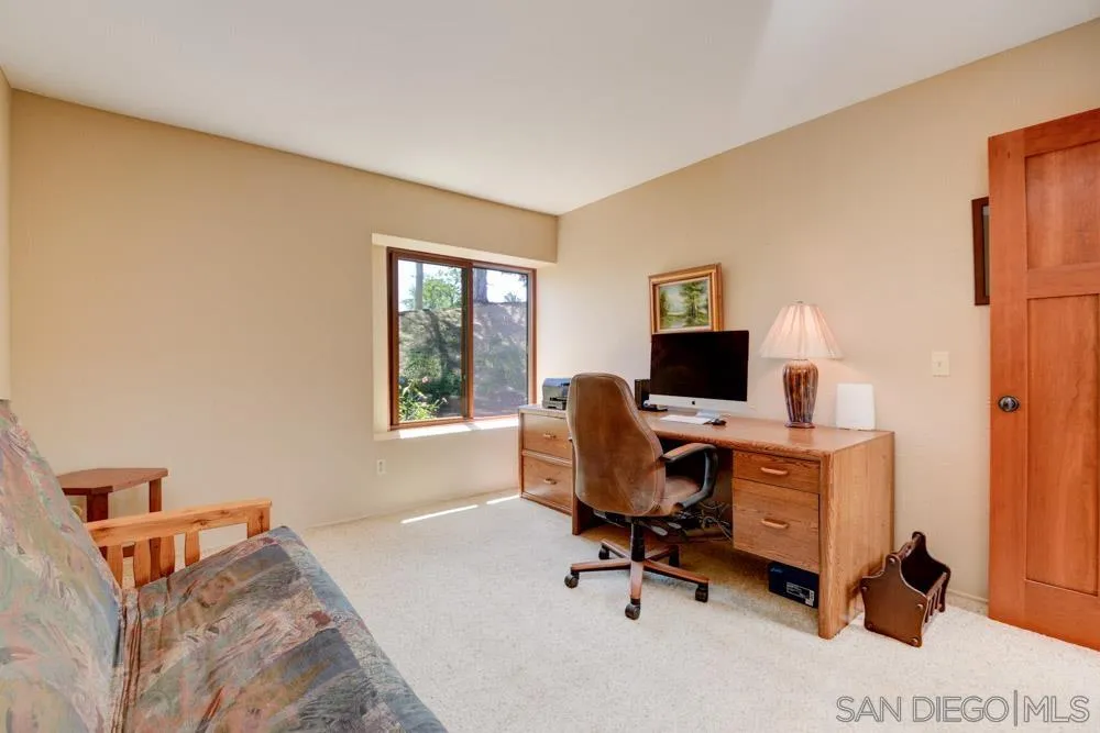 17758 Del Paso Drive Poway, CA 92064 - Photo 37 of 42 a view of a workspace with furniture and a window