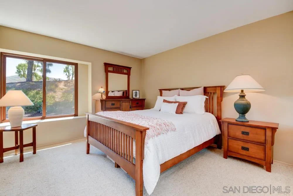 17758 Del Paso Drive Poway, CA 92064 - Photo 39 of 42 a bed sitting in a bedroom next to a window