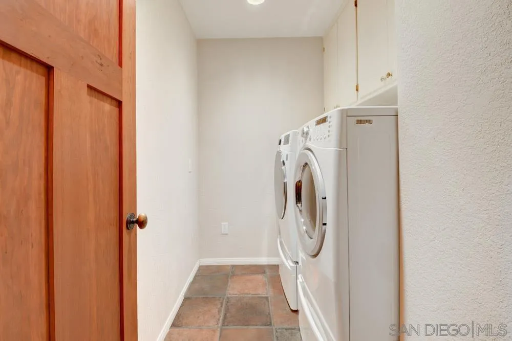 17758 Del Paso Drive Poway, CA 92064 - Photo 40 of 42 a utility room with dryer and washer