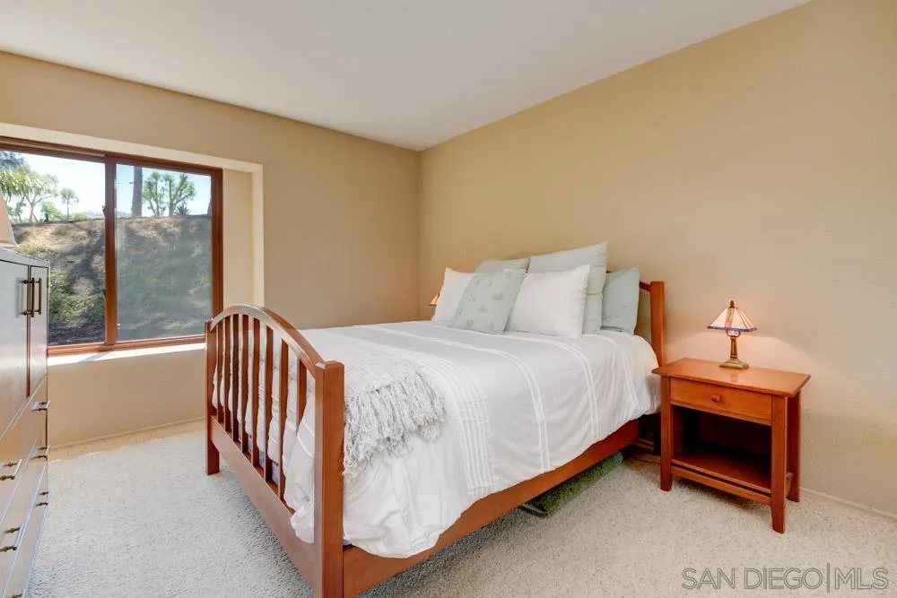 17758 Del Paso Drive Poway, CA 92064 - Photo 41 of 42 a bedroom with a bed and a large window