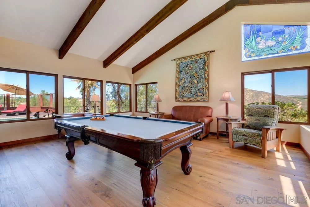 17758 Del Paso Drive Poway, CA 92064 - Photo 5 of 42 a living room with furniture pool table and flat screen tv