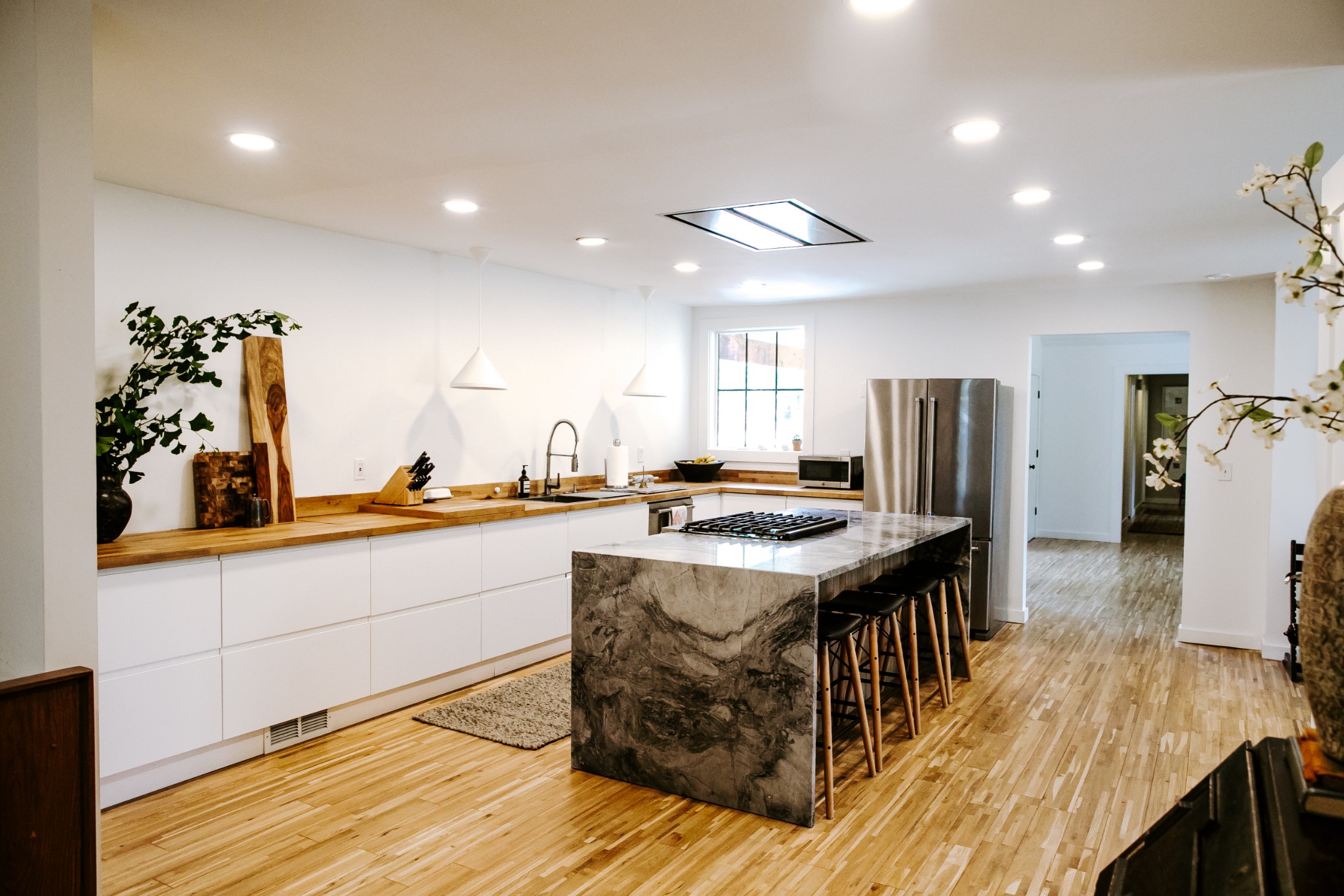 131 Baltusrol Road Franklin, TN 37069 - Photo 11 of 42 a kitchen with stainless steel appliances granite countertop a sink a stove and a refrigerator