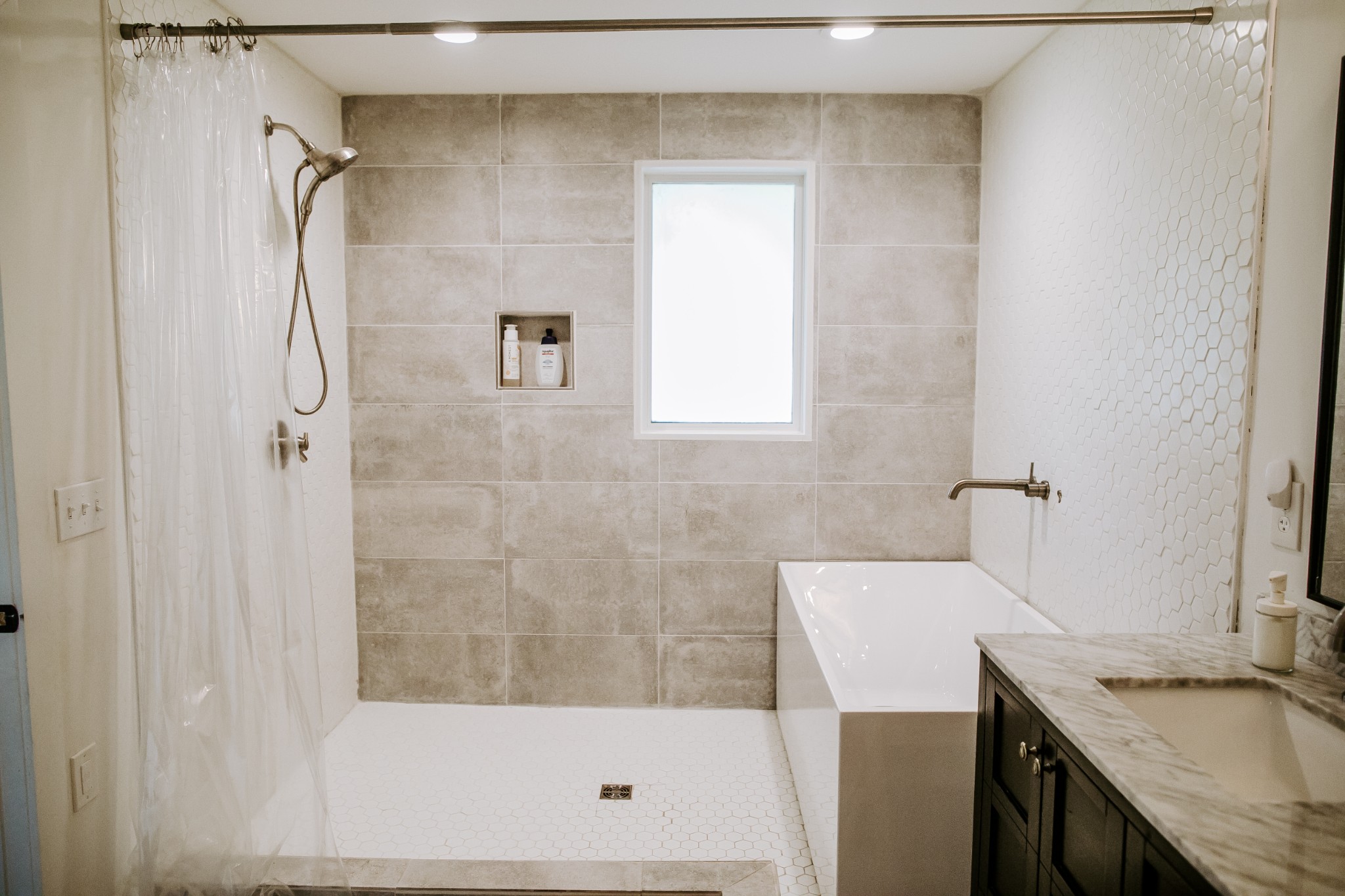 131 Baltusrol Road Franklin, TN 37069 - Photo 33 of 42 a bathroom with a granite countertop sink mirror and a bathtub