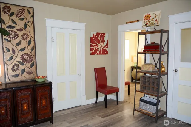 a room with furniture and wooden floor