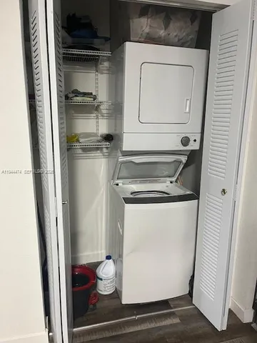 a utility room with washer and dryer