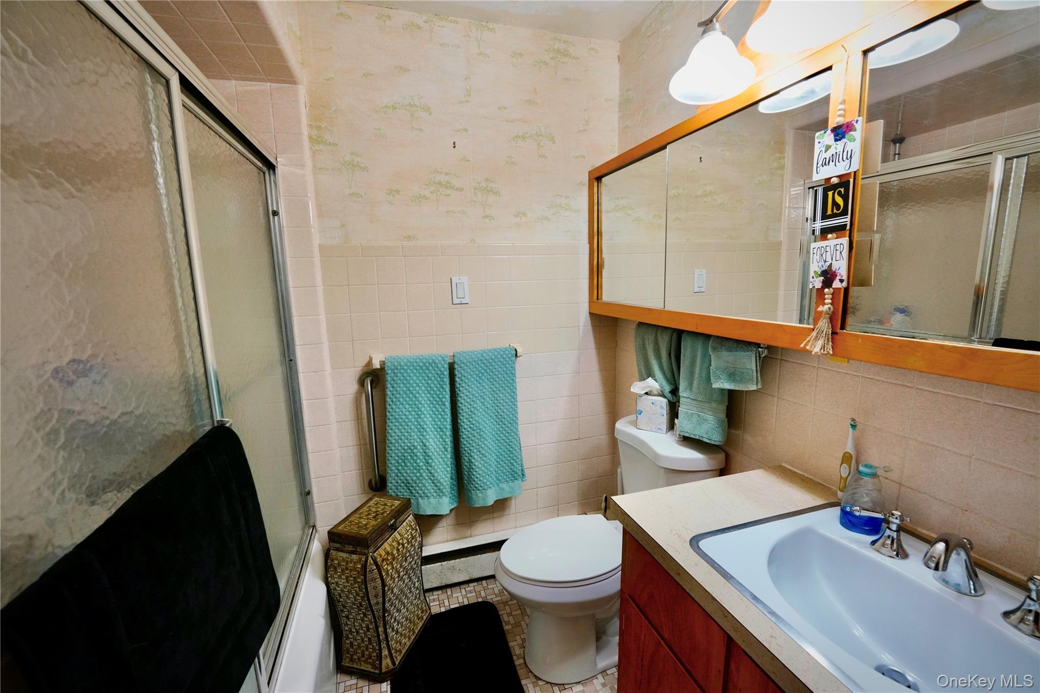 669 Shandelee Road Livingston Manor, NY 12758 - Photo 27 of 46 a bathroom with a sink toilet and shower