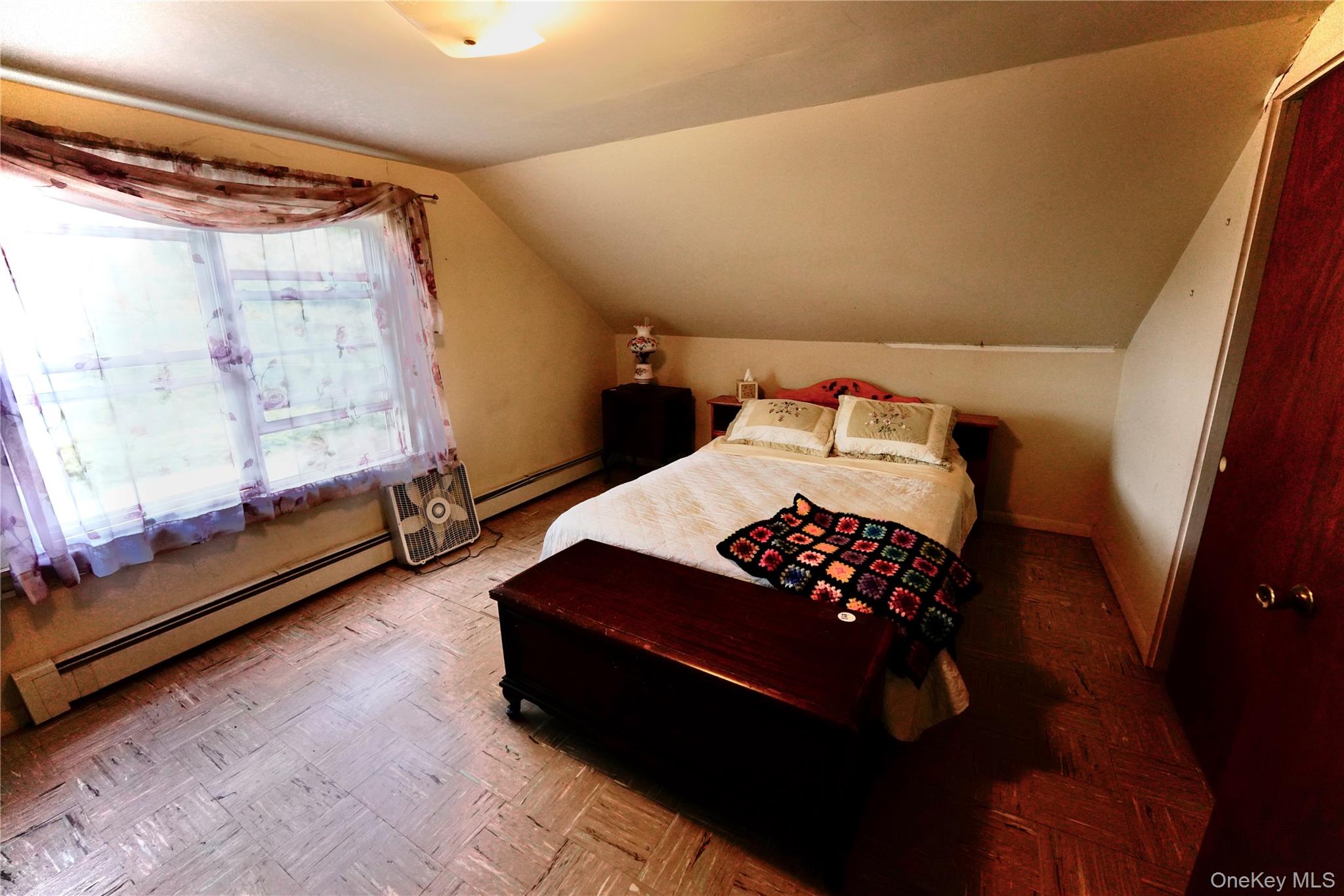 669 Shandelee Road Livingston Manor, NY 12758 - Photo 33 of 46 a bedroom with a bed and a window