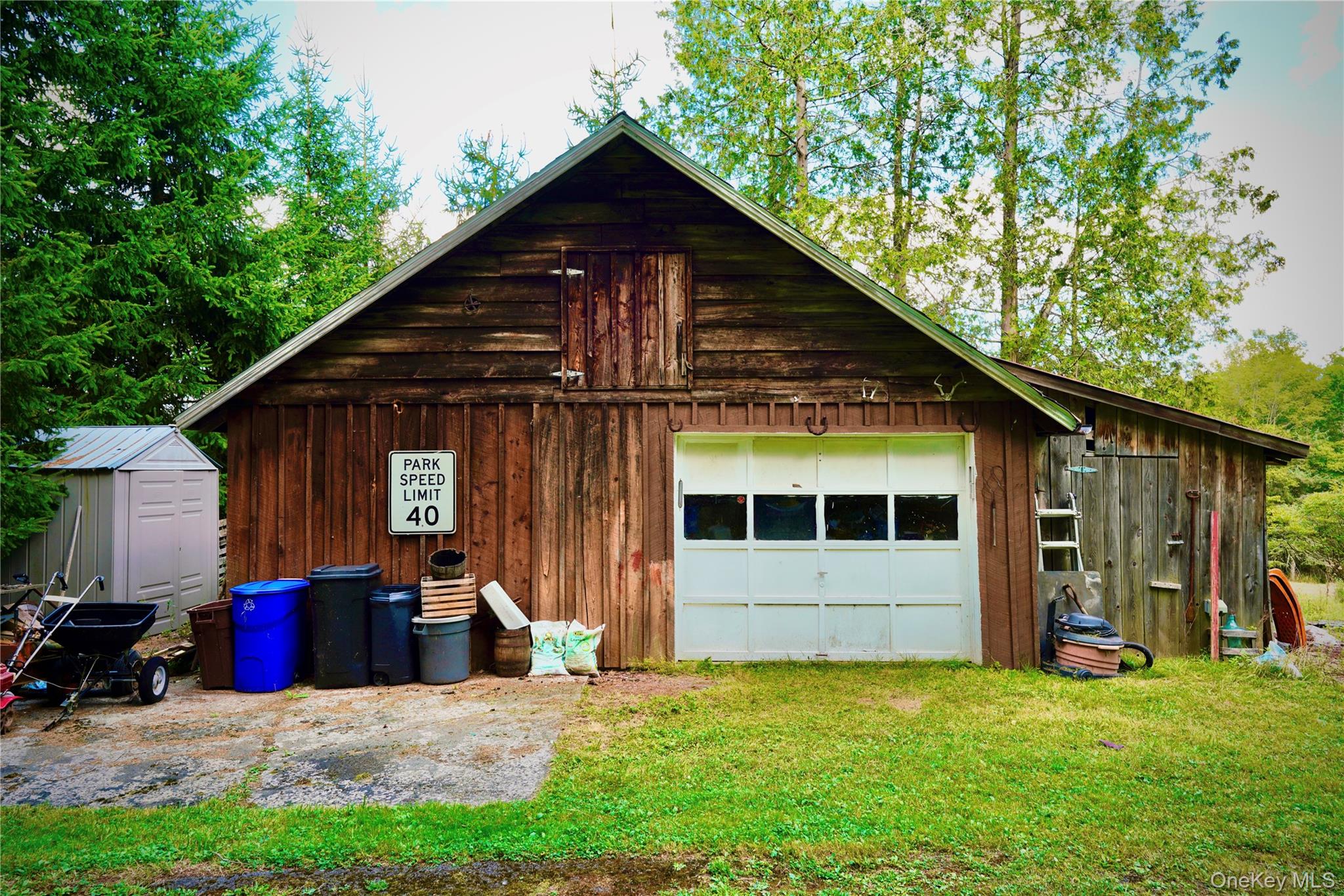 669 Shandelee Road Livingston Manor, NY 12758 - Photo 43 of 46 a view of a house with a yard