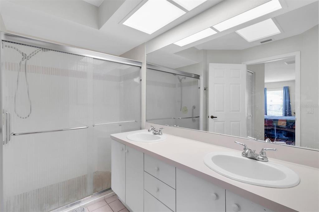 9052 Arundle Place New Port Richey, FL 34655 - Photo 17 of 57 a bathroom with a sink and a mirror