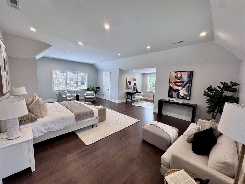 4 Kerri Lane Whitman, MA 02382 - Photo 18 of 24 a living room with furniture and a flat screen tv