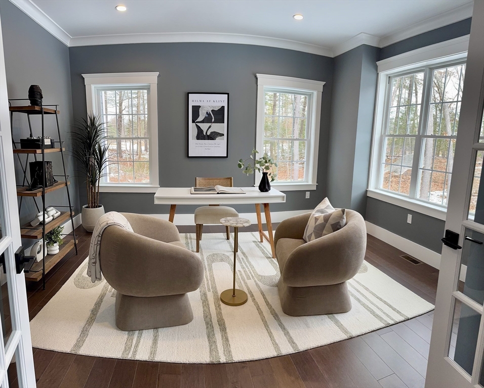 4 Kerri Lane Whitman, MA 02382 - Photo 9 of 24 a living room with furniture and a window