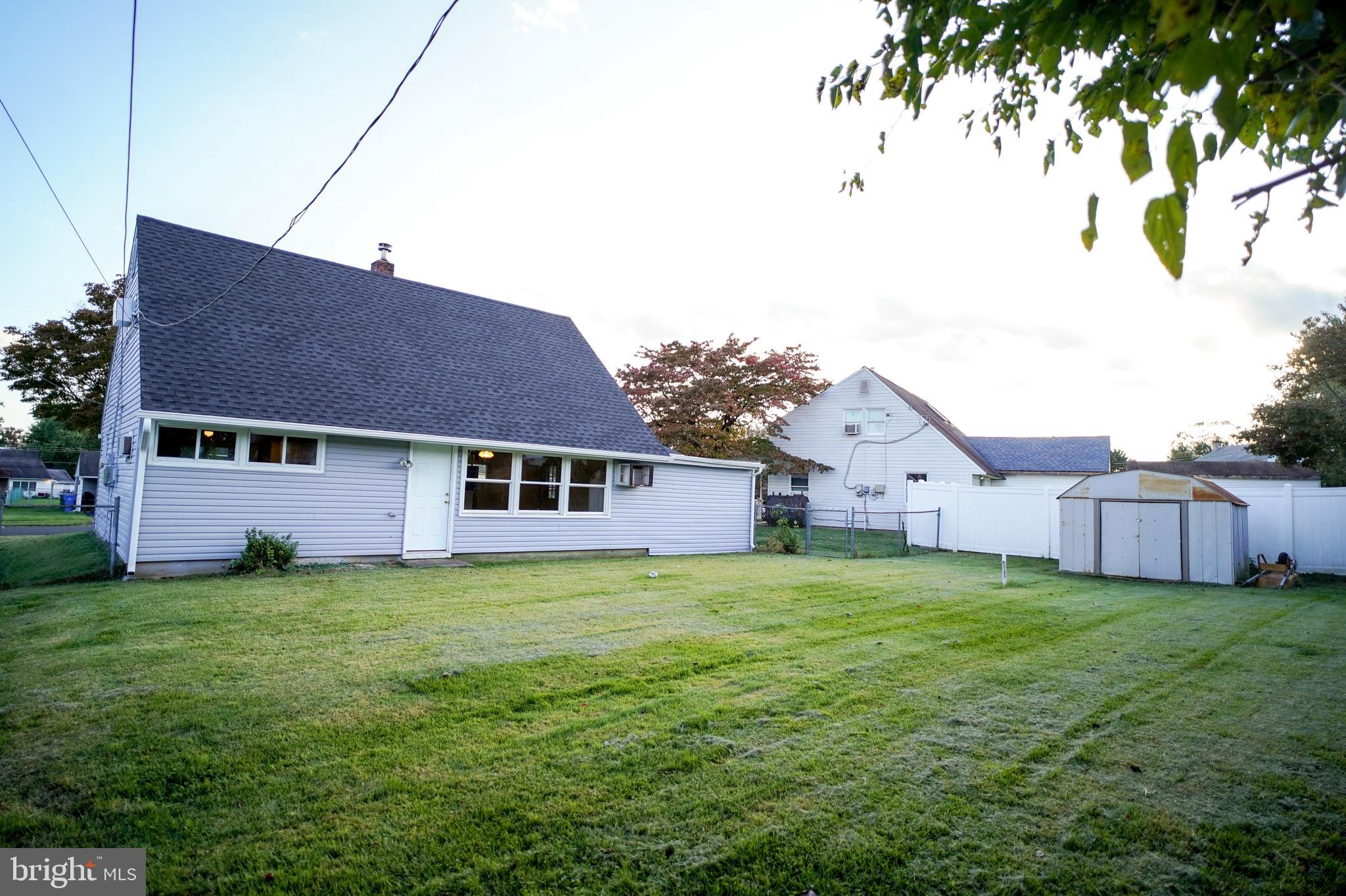 27 Inbrook Road Levittown, PA 19057 - Photo 25 of 33 Back of house and yard 1