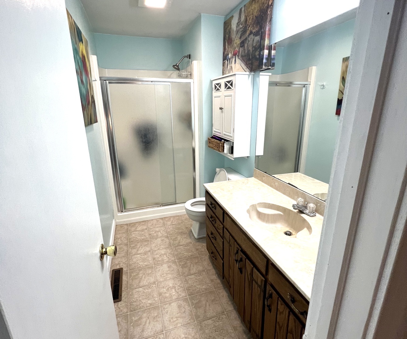 106 Spring Circle, Unit 106 Urbana, IL 61802 - Photo 18 of 18 a bathroom with a granite countertop shower sink and toilet